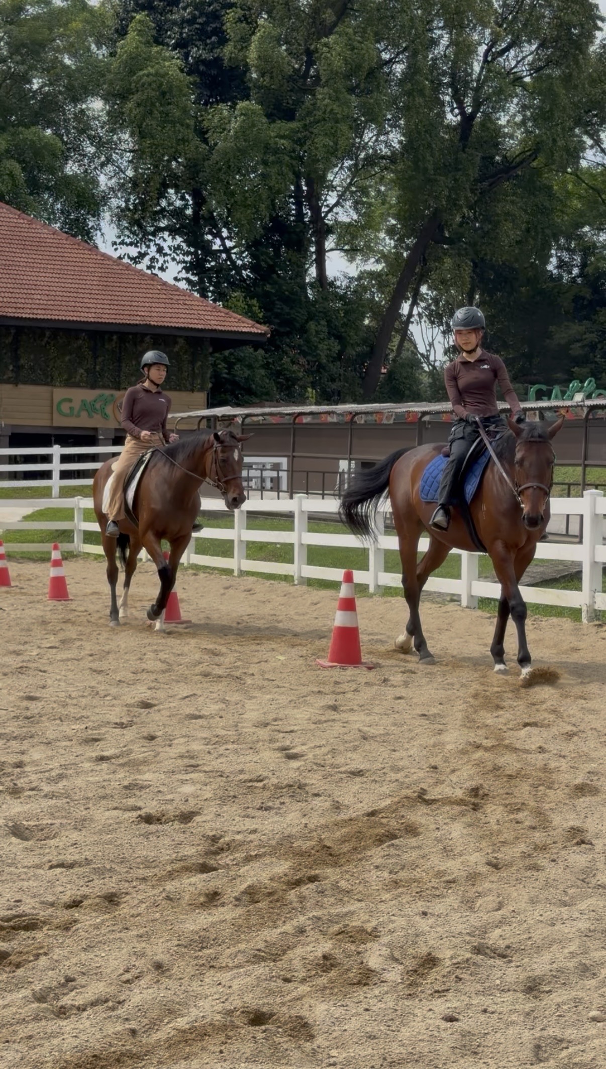 A young rider learning with an instructor
