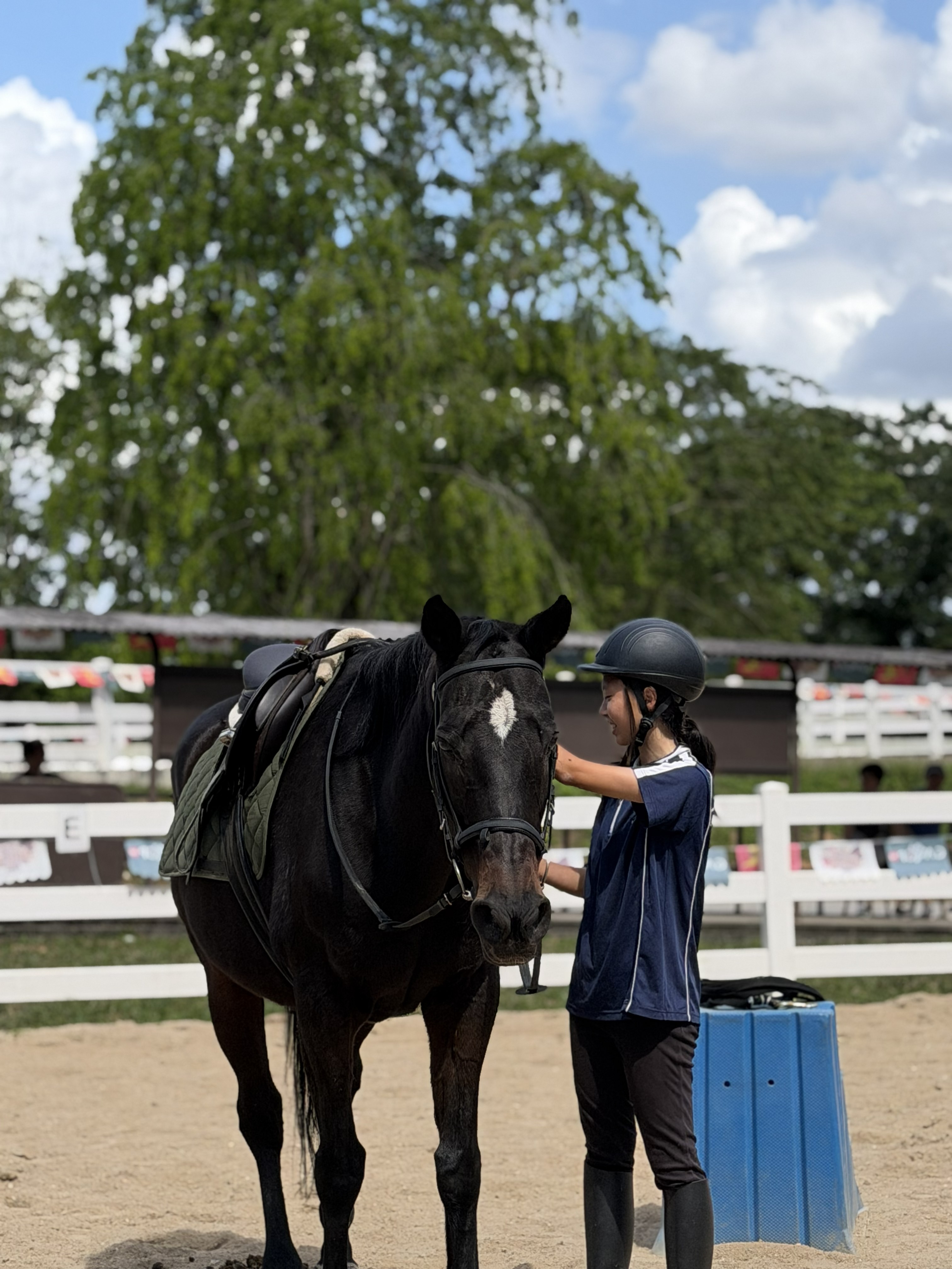 A student riding in a lesson session